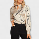 Blusa Elegante com Padrão Linear