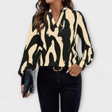 Carla - Blusa com Padrão Gráfico e Design Elegante