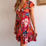 Vestido floral com babados e decote em V