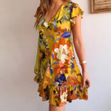 Vestido floral com babados e decote em V