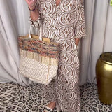 Vestido maxi estampado vintage com bolsos na lapela